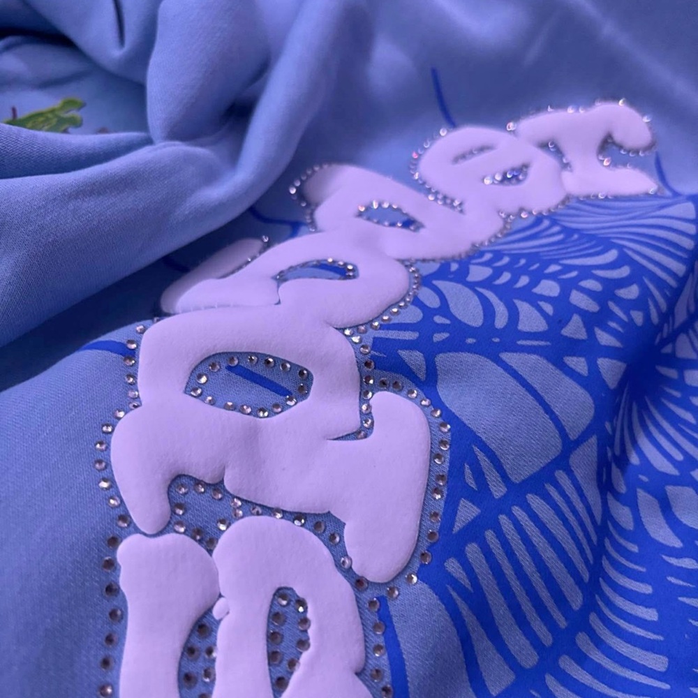 Sp5der 
 SkyBlue Graphic Tee with Rhinestone Accents